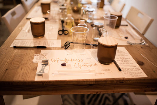 A candle making workshop setup featuring.